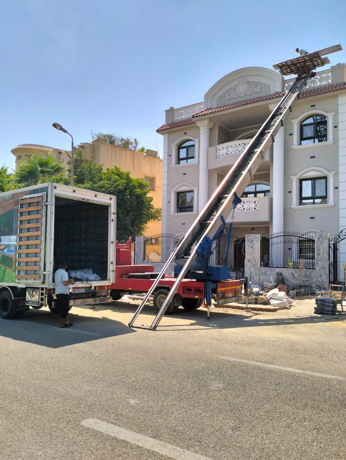 شركة نقل عفش حدائق الاهرام - ترحال تقدم خدمة الونش الهيدروليك